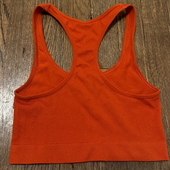 burnt orange cropped tank with a razor back & a small v in the front!🧡 - Picture 2 of 3